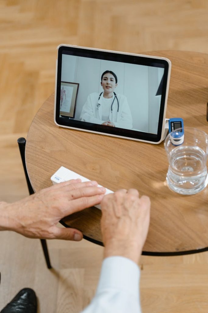 pexels photo 8376167 Elderly patient in video call with doctor using tablet. Healthcare technology concept.